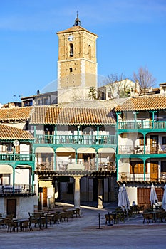 Central square of the town of Chinchon in Madrid, typical houses with wooden balconies and an old medieval atmosphere