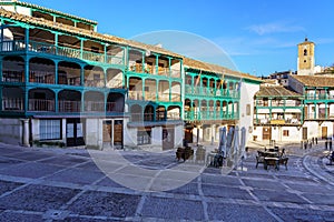 Central square of the town of Chinchon in Madrid, typical houses with wooden balconies and an old medieval atmosphere