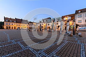 Central square in Zory after sunset.