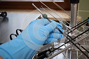 a central sterilization department, the instruments used for an endoscopic operation are placed in a washing basket for