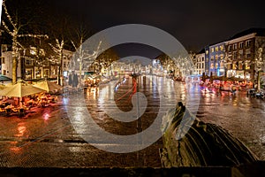 Central town square `brink` in tthe downtown center of deventer in the evening