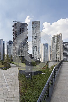 Central walking path of La Mexicana urban park photo