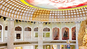 The Centre of Buddhism in Sanya. Temple with Lotus on the ceiling, Golden Buddha and many statues and goddesses.