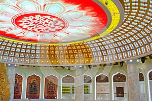 The Centre of Buddhism in Sanya. Temple with Lotus on the ceiling, Golden Buddha and many statues and goddesses.