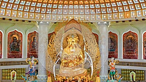 The Centre of Buddhism in Sanya. Temple with Lotus on the ceiling, Golden Buddha and many statues and goddesses.