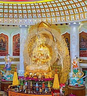 The Centre of Buddhism in Sanya. Temple with Lotus on the ceiling, Golden Buddha and many statues and goddesses.