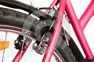 Centre-pull caliper brake or U-brakes on the rear of bicycle, isolated on white background