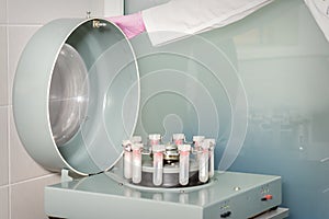 Centrifuge machine with blood test tubes