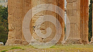 Centuries old temple remains, marble columns with ornamented capitals on top