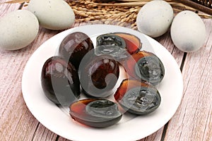 Preserved egg in cold sauce is a traditional dish photo