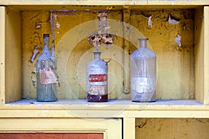 Century old bottles of chemicals on a shelf