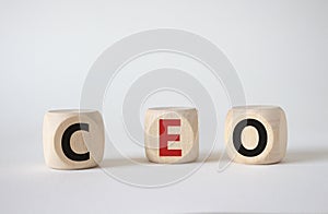 CEO - hief executive officer symbol. Concept word CEO on wooden cubes. Beautiful white background. Business and CEO concept. Copy