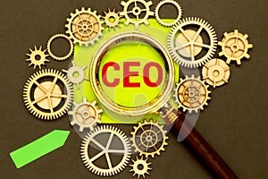 CEO symbol. Concept word CEO on wooden cubes. Beautiful yellow background. Business and CEO concept