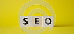 CEO symbol. Concept word CEO on wooden cubes. Beautiful yellow background. Business and CEO concept. Copy space