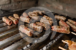 Cepavi balkan food on the grill, bosnian dish photo