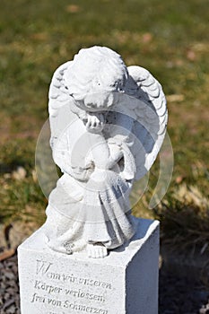 Ceramic angel, guarding angel cemetery, sleeping angel cemetery, dreaming angel cemetery, angel made from ceramic, angel cemetery