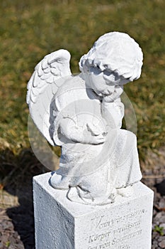 Ceramic angel, guarding angel cemetery, sleeping angel cemetery, dreaming angel cemetery, angel made from ceramic, angel cemetery