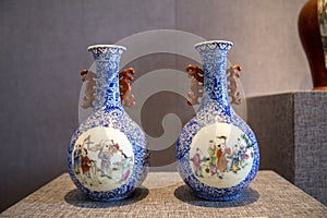 Ceramic art in the Republic of China, blue window to draw `children playing music map` bottle