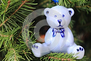 Ceramic blue bear hanging on the Xmas tree