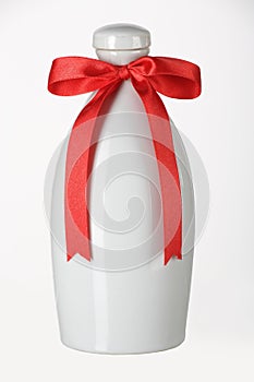 Ceramic bottle with red riband