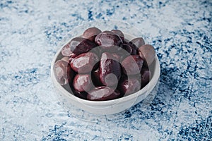 ceramic bowl with some kalamata olives