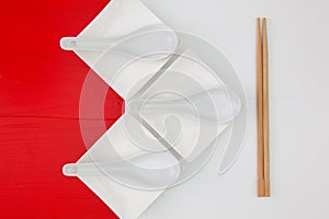 Ceramic bowls and bamboo chopsticks for sushi food