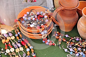 Ceramic bowls and beads on them