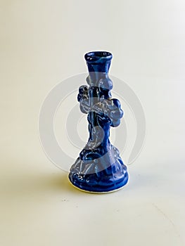 Ceramic candlestick on a white background