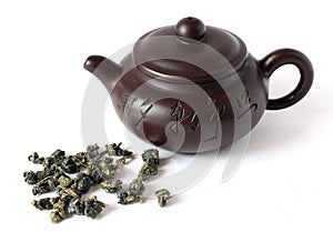 Ceramic China teapot and oolong tea on white