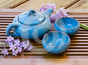 Ceramic chinese tea set with flower decorations