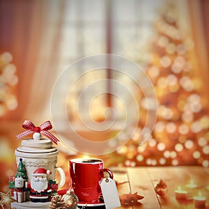 The Ceramic Christmas coffee set with price tag is on the bokeh Christmas scene.