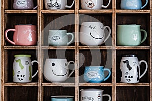 Ceramic Coffee Mugs on Handmade Wooden Rustic Wall Shelf