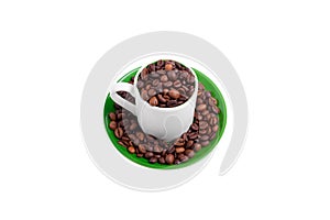 Ceramic cup on a green saucer filled with coffee beans