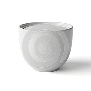 Ceramic cup with a smooth glossy surface is placed against a white