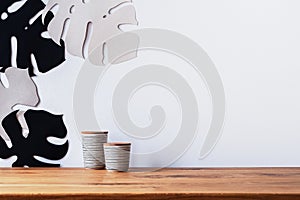 Ceramic cups and leaf stencils