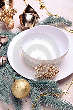 Ceramic dishes with golden Christmas decor