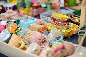 Ceramic dishes, tableware and jugs sold on Easter market in Vilnius. Lithuanian capital`s traditional crafts fair is held every