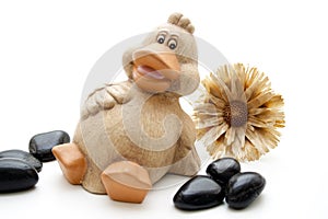 Ceramic duck with stones