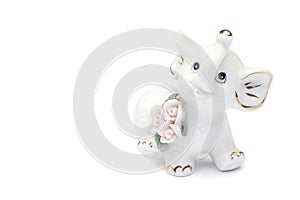 Ceramic elephant figurine isolated over white with clipping path