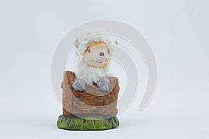 Ceramic figurine of an Easter lamb on a white background
