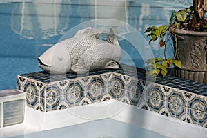 Ceramic Fish near Pool