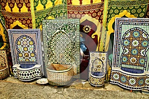 Ceramic fountains for sale at a market stall