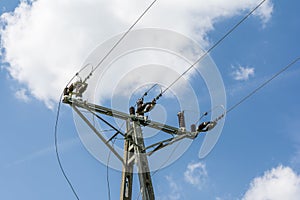 Ceramic insulators on power pole