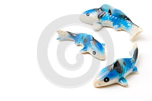 Ceramic of Koi fish sculptors. Use to decorate photo