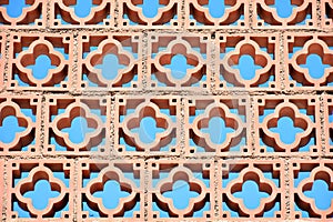 Ceramic lattice with blue sky in the background photo