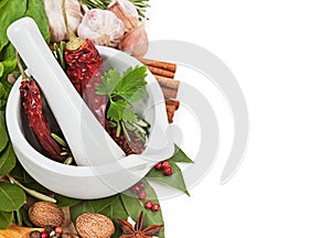 Ceramic mortar and spices on white background and copy space