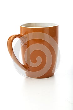 Ceramic orange mug for hot drinks