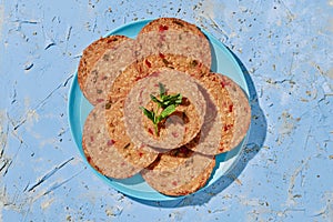 ceramic plate with some slices of vegan roll