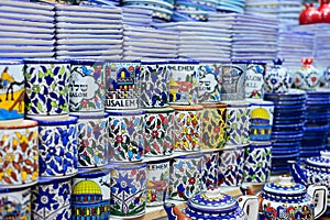 Ceramic plates and other souvenirs for sale on Arab baazar located inside the walls of the Old City of Jerusalem