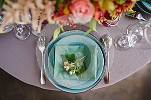 Ceramic plates on a round table